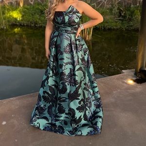 Emerald green, blue and black A line floor length gown.